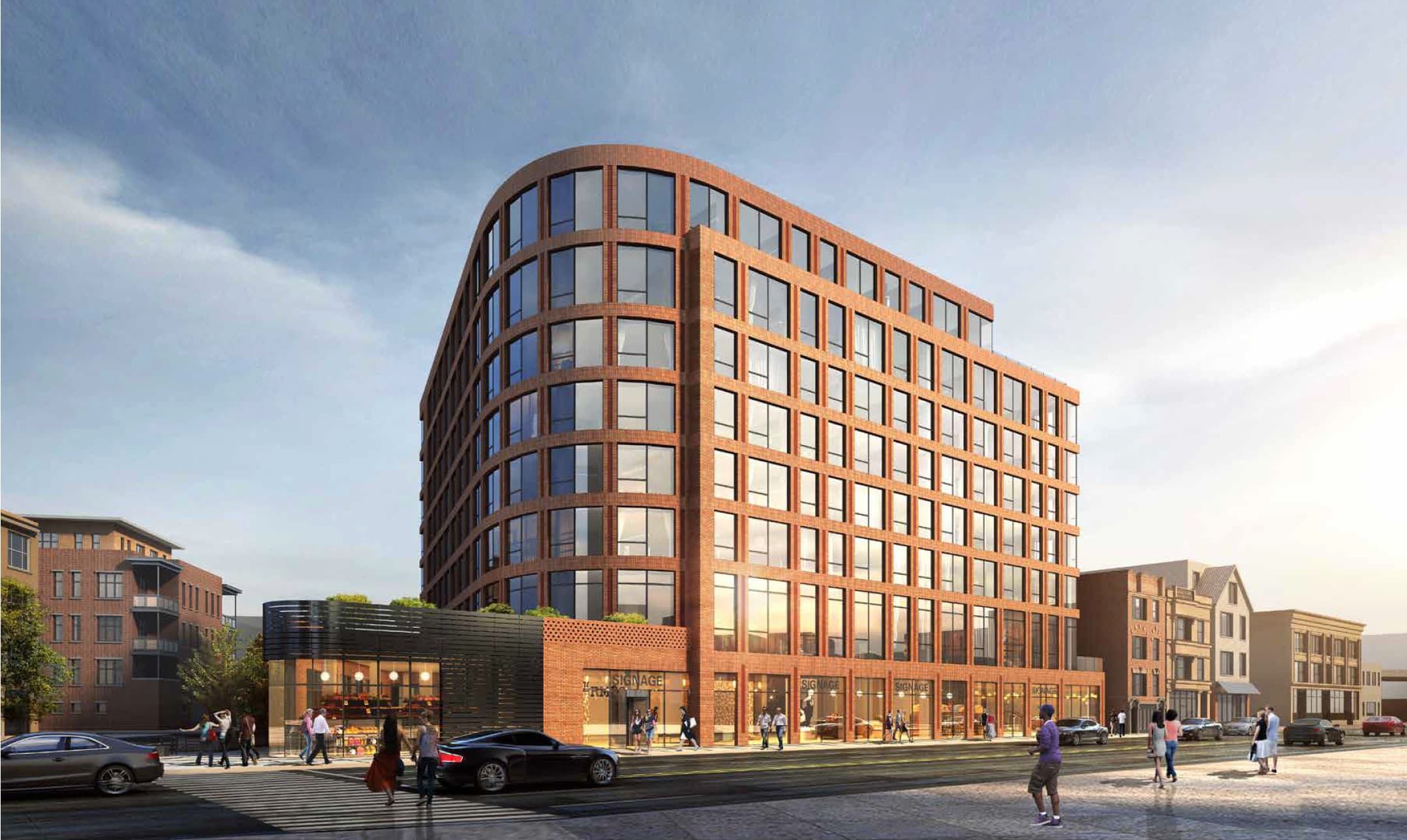 Rendering of the 3300 N Clark brick apartment building with a curved corner and ground-floor shops